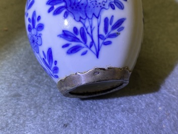 Three Chinese silver-mounted blue and white vases and a teapot, Kangxi